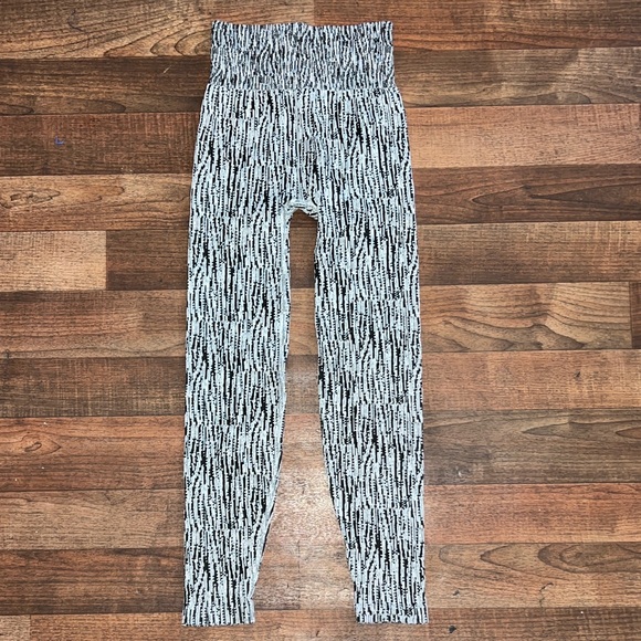 Athleta Flurry Elemental Tights in a black and white snowscape - Picture 2 of 7